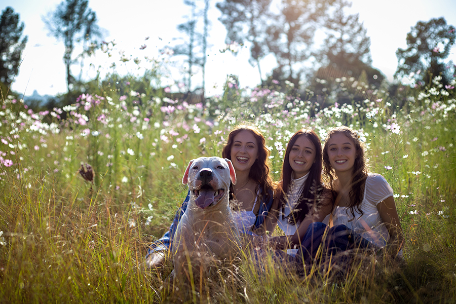 girls in the cosmos with their dog